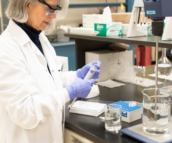 Scientist performing lab services